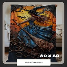 an image of a woman with a broom on the cover of a blanket that has been made to look like a witch