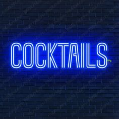 a blue neon sign that says cocktails on a brick wall in front of it