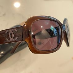 This Is An Authentic Pair Of Chanel Brown Cc Logo Sunglasses 5102. Caramel Ribbon Acetate Frames With Radiant Copper Metal Baguettes For The Chanel Cc Logo On The Temples. In Excellent Pre-Owned Condition, Very Light Wear. Comes With The Original Case And Lens Cloth Bag. Logo Sunglasses, Sunglasses Logo, Brown Sunglasses, Chanel Sunglasses, Chanel Accessories, Vintage Color, Cloth Bag, Brown Vintage, Copper Metal