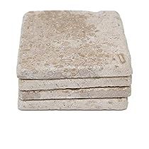 four white stone coasters stacked on top of each other