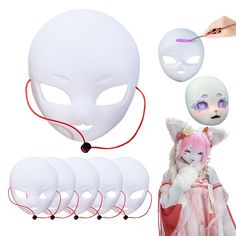 a white mask with pink hair and several other masks around it, including a cat