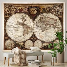 an old world map is hanging on the wall