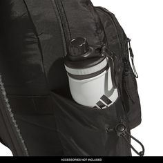 the back pack has a water bottle in it