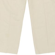 Description:Vintage Carrera beige trousers, fit a UK size 16 - high waisted with a 34" waist. Size conversion: US Size: 12EU Size: 44IT Size: 48 RISE TYPE: High WaistedWAIST: 34 inches / 86cmsINSEAM: 28 inches / 71cmsRISE: 12 inches / 30cmsGENDER: womens CONDITION: good - small dark mark on front as shownSTYLE: trousersERA: 1990sCOLOUR: beigeFABRIC: cotton Beige Flat Front Dress Pants With Welt Pockets, Classic Straight Leg Cream Dress Pants, Classic Cream Tapered Leg Bottoms, Classic Beige Bottoms With Pockets, Classic Cream Straight Leg Dress Pants, Classic Beige Dress Pants With Pockets, Classic Beige Tapered Leg Bottoms, Classic Cream Straight Leg Bottoms, Classic Beige Chinos For Summer