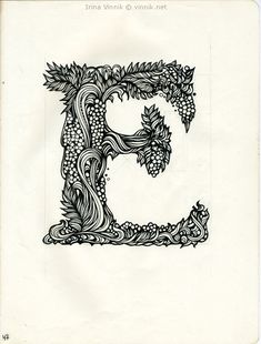 the letter e is made up of vines and leaves, with an ornate capital g