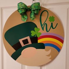 a st patrick's day door hanger with a leprechaun hat