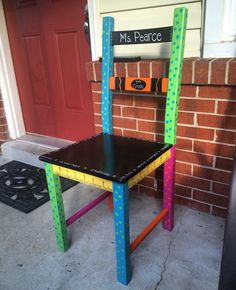 a wooden chair made to look like a ruler