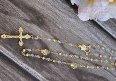 "FAST SHIPPING Beautiful and Unique Handcrafted Rosary Silver or gold linked chain and crucifix. Approx. 20\" round and 15\" total length. Gift box included!! Please see the 2 last pictures for the options on the gift box. Great for Wedding, Christening, First Communion, Confirmation, Gift, etc. Style YB-ROS-07 FAST SHIPPING: We usually ship in 1 or 2 business days. A lot of our items are one of a kind and sells really fast. So if you really like something, don't wait to order." Adjustable Gold Rosary With Cross, Adjustable Gold Cross Rosary, Handmade Gold Jewelry For First Communion, Handmade Gold Jewelry For Baptism, Gold Cross Rosary For Wedding, Gold Wedding Rosary With Cross Shape, Adjustable Gold Rosary For First Communion, Adjustable Gold Rosary For Baptism, Rosary Wedding