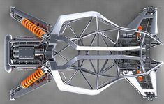 an overhead view of a vehicle with orange springs on the front and rear suspensions