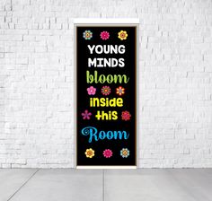 a door with the words young minds bloom inside this room