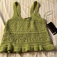 This Nwt Chartreuse Green Knit Tank Is Very Fashionable, The Knit Is Medium Weight And Porous On The Lower Trunk. Great With Some White Pants Or Denim Shorts, For A Summer Look Or Under A Sweater With Slacks For A More Professional Look! Casual Crochet Knit Sweater, Green Knitted Summer Sweater, Green Knitted Cotton Tops, Summer Green Knitted Sweater, Green Crochet Top With Pointelle Knit, Green Cotton Knitted Tops, Stretch Green Knit Crochet Top, Green Knit Top For Spring, Spring Green Knit Top