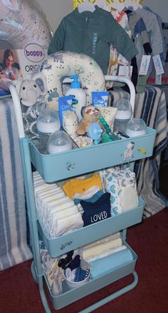 a baby changing table with diapers and toys on it's shelf in a room