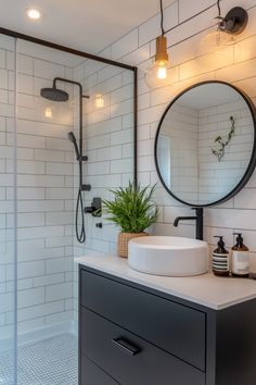 a bathroom with a sink, mirror and shower