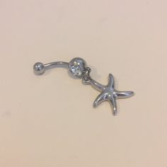 Standard 14mm Gauge Stainless Steel. Clear Gem With Dangling Starfish. Super Cute! All Body Jewelry Is Sterilized Prior To Purchase Adjustable Silver Star Belly Ring, Belly Button, Girly Jewelry, Starfish, Belly Button Rings, Body Jewelry, Super Cute, Gems, Women Jewelry