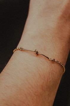 A gorgeous, tied love knot bracelet. This unique piece adds a touch of sparkle to your everyday look. It is a great sentimental gift and looks lovely when layered with other bracelets. The chain on this piece measures about 1.8mm in thickness. CHOOSE FROM: Small | 6-6.5" Medium | 7-7.5" Large | 8-8.5” Bracelet comes with a lobster clasp and 1/2 inch extender. Available in 14K GOLD FILL, 14K ROSE GOLD FILL or STERLING SILVER. *Gold Filled metals are allergy friendly, durable and overall higher qu Love Knot Bracelet, Tied Knot, Flat Back Earrings, Bold Rings, Symbolic Jewelry, Solid Gold Earrings, Travel Jewelry Case, Knot Bracelet, Solid Gold Rings