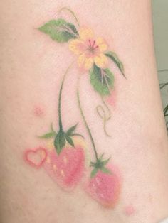 a tattoo with flowers and hearts on it