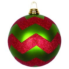 a green and red christmas ornament on a white background