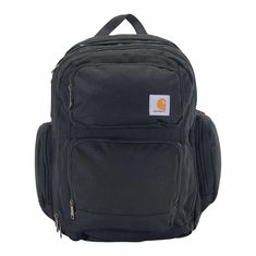 This 35L work backpack is tough enough for the jobsite and spacious enough for a weekend trip. It's designed with several pockets on the inside and out, including a padded sleeve for laptops up to 17 inches. The bag is made of heavy-duty material that sheds light rain, with a reinforced base for extra strength. Features1200-denier Polyester with Rain Defender™ durable water repellent and Duravax™ basePadded air mesh back panel and contour fit shoulder straps with FastDry™ technology wicks away s Carhartt Backpack, 35l Backpack, Carhartt Bag, Work Backpack, Light Rain, Gear Bag, Weekend Trip, Portable Charger, Work Bag