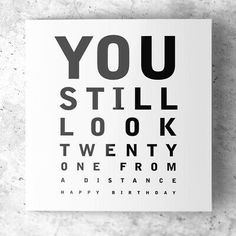 an eye chart card with the words you still look twenty from a distance on it