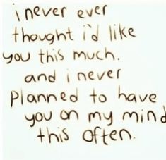 a handwritten poem written in brown ink on white paper with the words never ever thought i'd like you this much and i never planned to have you on my mind