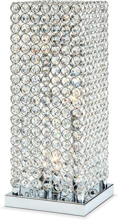 a crystal table lamp on a white background