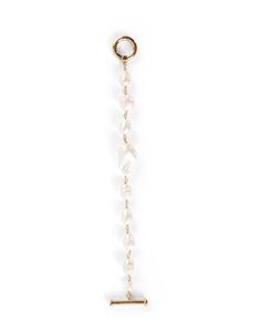 Kenneth Jay Lane is known for statement-making styles with feminine touches, as seen in this bracelet. This bracelet is crafted from gold-tone chain and embellished with sweet freshwater pearls. Pair it with your transitional styles for a touch of elegance. Luxury Pearl Chain Gold Bracelet, Formal Gold-plated Pearl Chain Bracelet, Gold And Pearl Bracelet, Elegant Luxury Hand-strung Pearl Bracelet, Formal Gold-plated Chain Bracelet With Lobster Clasp, Elegant Gold-tone Chain Bracelet With Lobster Clasp, Valentines Frames, Frances Valentine, Skirt And Top Dress