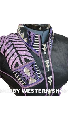 a black jacket with purple and white designs on it