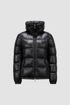 A modern take on a classic puffer, the Douro down jacket presents tactical quilting designed to enhance the silhouette. The short puffer is crafted from recycled longue saison, a nylon fabric notable for providing supreme warmth while maintaining a light weight. The jacket is finished with a practical pull-out hood hidden in the stand collar. Black Puffer, Down Jackets, Nylon Fabric, Quilting Designs, Stand Collar, Down Jacket, Puffer, Quilting, Jackets For Women