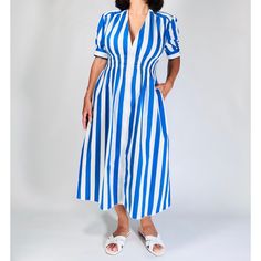 This Is A New With Tags Solid & Striped "The Delilah Dress" In Size Large. The Dress Is Made Of 100% Cotton And Features A Blue And White Vertical Stripe Pattern. It Has A V-Neckline, Short Sleeves, And A Fitted Bodice With A Smocked Elastic Waistband. The Skirt Is Full And Flows To The Mid-Calf. The Dress Has Two Side Pockets The Dress Is In Excellent Condition And Has No Visible Imperfections. It Comes With The Original Tags. Size L, Please Review Measurements To Confirm Fit. Royal Blue Summer Workwear Dress, Royal Blue Fitted Dress For Day Out, Blue Short Sleeve Lined Midi Dress, Blue Lined Midi Dress For Daywear, Striped Dresses, Nautical Dress, Solid & Striped, Fitted Bodice, Striped Dress