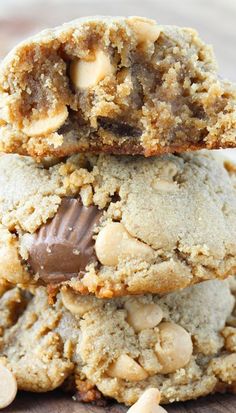 three cookies stacked on top of each other with a bite taken out of one cookie