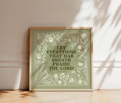 a green framed poster with the words let everything that has break through the lord on it