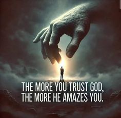 a man standing in front of a giant hand with the words, the more you trust god, the more he amazes you