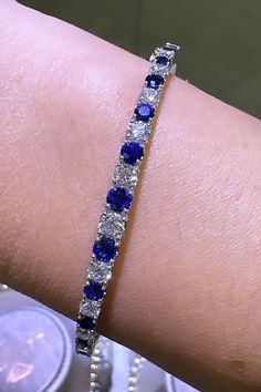 What's better than a white gold bangle? Diamond & Sapphire gold bangle of course! You'll adore the sparkling diamond stones that enrich this bangle with brilliance. You can wear this fabulous bangle with absolutely anything.Metal: 18K White GoldDiamond Weight: 11 Round Brilliant cuts 1.66ct t.w.Sapphire Weight: 10 Round cuts 1.77ct twSetting: ProngBangle Width: 57mm X 49mm Estimated production time is 4 - 5 weeks. Bangle Diamond, White Gold Bangle, Sparkling Diamond, Gold Bangle, Sparkle Diamonds, Round Brilliant Cut Diamond, Diamond Stone, Gold Bangles, Brilliant Cut Diamond