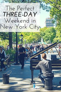 a man sitting at a piano in the middle of a park with people walking around