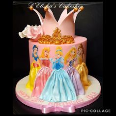 there is a pink cake with princesses on it