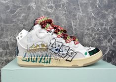 SMOOTH and SLEEK Design FREE SHIPPING & RETURNSDUTIES & TAXES INCLUDE Sneaker Graffiti, Curb Sneaker, Lanvin Sneakers, Lanvin Men, White Studs, White Leather Sneakers, Luxury Sneakers, Graffiti Prints, Hot Sneakers