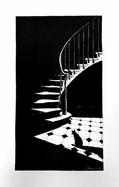 a black and white photo of a spiral staircase