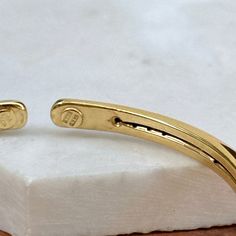 14KT yellow gold oval, knife-edge, slip-on cuff bangle bracelet. Great, lightweight piece for layering! A modern look! Measures 6 + 5/8" Around Width: 5.5mm Slip On; No Clasp Hollow bangle Weight: 4.90 grams Finished on all sides Stamped 14K Made in Italy Gold Knife, Cuff Bangle Bracelet, Cuff Bangles, Bangle Bracelet, Cuff Bracelet, Bangle Bracelets, Layering, Bangles, Slip On