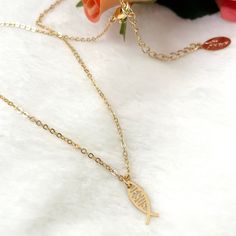 This delicate gold-plated Christian fish necklace is a mindfulness gift, it's perfect as a Baptism gift or as a girlfriend gift as well.  You will look adorable wearing this dainty necklace. The cute necklace you'll never want to take off. Perfect as a layering necklace. 💗 ITEM DETAILS: Total Length: 14 - 16 - 18 - 20 inches. The length of the necklace refers to the total length from end to end. Pendant size: Width 0.6mm -  Height 1.5mm Materials: 18K Gold plated chain - 18K Gold plated charm. Color necklace available: Gold. 💗 IF YOU WANT TO MAKE A SET, visit the following link for the earrings👇🏻 https://www.etsy.com/listing/1396625592/tiny-gold-hoop-earrings-fish-earrings?click_key=d711db464cd3938d9e46890fa316622f54bd7998%3A1396625592&click_sum=0b762eeb&ref=shop_home_active_1 💗 GIFT Gold Fish-shaped Necklace For Gift, Christian Friendship, Jesus Necklace, Christian Signs, Tiny Fish, Fish Earrings, Christian Necklace, Fish Necklace, Color Necklace