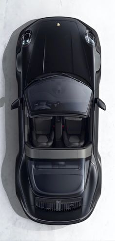 an overhead view of a black sports car