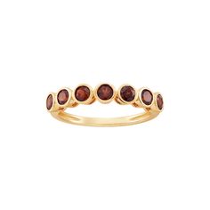 Wear it alone or stack it up with your favorite pieces! Crafted in 10K yellow gold, this ring features round-cut natural garnet stones that are set halfway across the band. This January birthstone ring is versatile enough to pair with any outfit or jewelry in your wardrobe. Size: 8.  Gender: female.  Age Group: adult. January Birthstone Rings, January Birthstone, Garnet Stone, Birthstone Ring, Band Ring, Women Rings, Round Cut, Band Rings, Womens Watches