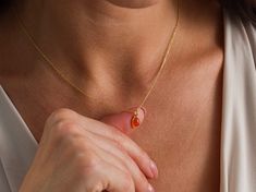 Enhance your style with our stunning Drop Carnelian Necklace, handcrafted with love and precision. This exquisite piece features a natural carnelian gemstone, known for its vibrant orange-red hue and unique metaphysical properties. Perfect for any occasion, this minimalist gemstone necklace is designed to add a touch of elegance to your everyday look. Important features of the necklace: Real Carnelian Natural Stone, Allergy-free natural gold plating, 925 Sterling Silver Material Product Details: Yellow Gold Chalcedony Jewelry Gift, Carnelian Gemstone Beads Jewelry Gift, Elegant Carnelian Round Pendant Necklace, Yellow Gold Chalcedony Gemstone Necklace, Elegant Carnelian Pendant Necklace, Elegant Carnelian Round Pendant Jewelry, Orange Agate Jewelry As A Gift, Yellow Gold Chalcedony Necklace As Gift, Gold Carnelian Birthstone Jewelry