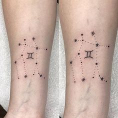 two tattoos on both legs with zodiac signs