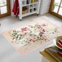 a kitchen area rug with flowers on it