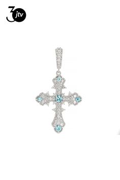 Judith Ripka 0.82ctw Blue Zircon and Pave 1.58ctw Bella Luce�� Diamond Simulant Rhodium Over Sterling Silver Victoria Cross Enhancer. Measures Approximately 1.95"L x 1.08"W. Hinged Snap Clasp. Gift Jewelry With Blue Topaz In Pave Setting, Blue Cubic Zirconia Jewelry With Pave Setting, Judith Ripka, Diamond Simulant, Blue Zircon, Cubic Zirconia, Sterling Silver, Silver, Blue