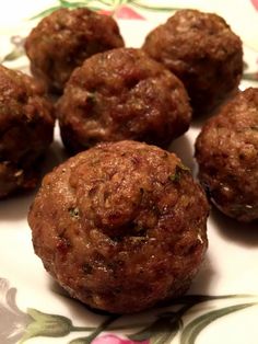 some meatballs are on a plate and ready to be eaten