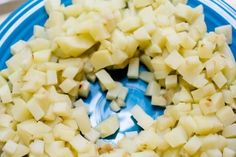 chopped potatoes on a blue and white plate