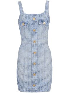 Indulge in modern luxury with this stunning all-over monogram denim dress from Balmain. The rich blue denim fabric, combined with the debossed monogram pattern, elevates this dress to a whole new level of sophistication. The square neckline and decorative button detailing around the waistline exude an edgy, yet elegant vibe that is perfect for any occasion, from casual outings to special events. With its rear zip fastening, this dress offers a seamless and stylish fit that will make you stand ou Short Denim Dress, Edgy Dress, Balmain Dress, Blue Denim Dress, Short Denim, Monogram Pattern, Faded Denim, Denim Mini Dress, Vestido Casual