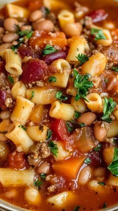 This Copycat Olive Garden Pasta e Fagioli is a comforting, hearty soup full of rich flavors and wholesome ingredients. With a savory combination of ground beef, tender vegetables, beans, and perfectly cooked pasta, this soup is sure to satisfy. It’s easy to make and ideal for a cozy family dinner or meal prep for the week. Best of all, this version captures the essence of Olive Garden’s famous dish while allowing you to enjoy it at home. Pasta Y Fagioli, Olive Garden Bean Soup, Olive Garden Slow Cooker Pasta Fagioli, Olive Garden Pasta E Fagioli Soup Crockpot, Pasta Fragole Soup, Olive Garden Copycat Soup, Copycat Pasta Fagioli Olive Garden Soups, Hearty Home Cooked Meals, Pasta E Fagioli Olive Garden