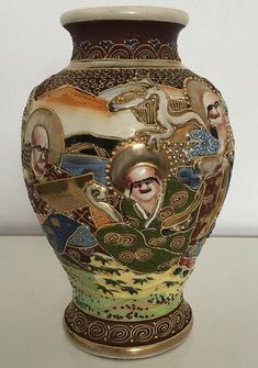 a vase with an image of a man on it